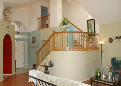 Elegant Custom Stairway Overlooks Entry