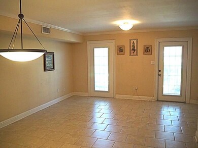 Living Room leading out to Patio Area.