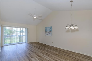 Very open floor plan with new flooring, freshly painted interior, and cathedral ceiling.