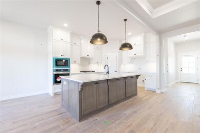 Kitchen featuring stainless steel appliances, visi