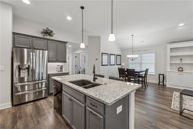 Large Sink, Stainless Refrigerator, Open to Dining