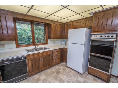 Kitchen with wooded view