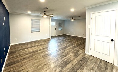 Step into a spacious and inviting open-concept liv
