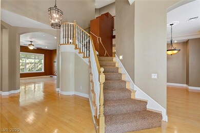 Enter through the doubled beveled glass doors into