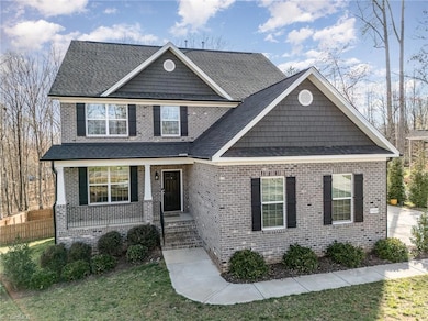 7509 Quail Crossing Rd, Stokesdale, NC 27357 - photo 2