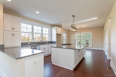 Better view of the kitchen and morning room.  The