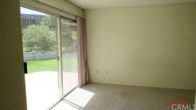 Master bedroom with slider to back patio & big yar