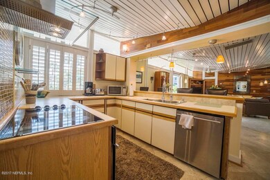 view of kitchen with living area in back