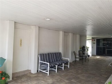 Individual storage units are located behind locked doors in the breezeway.