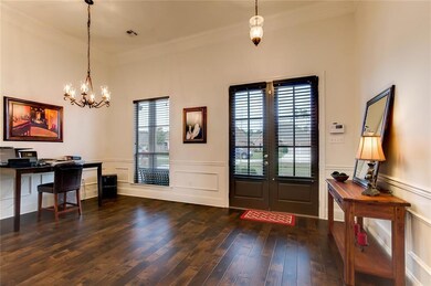 This formal dining room is spacious and located pe