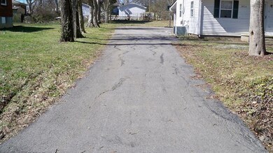 PAVED DRIVE AND LARGE TURN AROUND