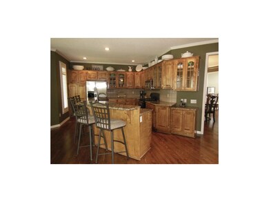 Kitchen features granite. Gas stove/electric oven 