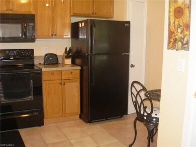 A pantry and cozy breakfast nook are shown here.