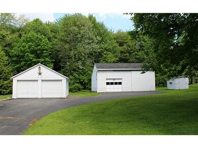 Parking Lot/Garage. Two car garage, large pole bui