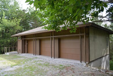 Huge 3 Car Garage & Workshop