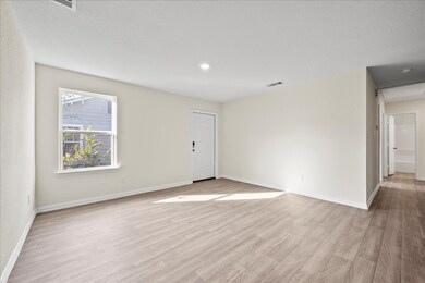 
Another view of the living room highlights a larg