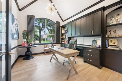 Office vaulted ceiling, light hardwood, crown mold