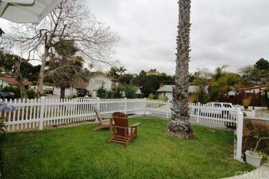 Grassy front yard is a great place to enjoy the ne
