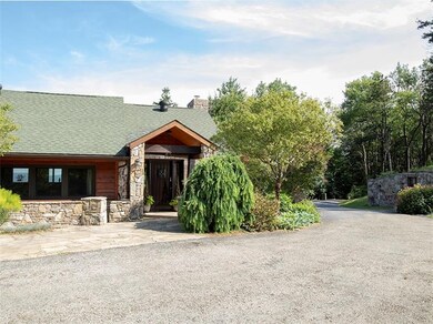 Front door covered entry with wine cellar built in