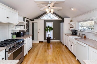 VIEW INTO GORGEOUS KITCHEN FROM FRONT ENTRY AREA -