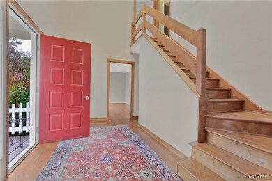 Covered front porch & enter into the two story foy