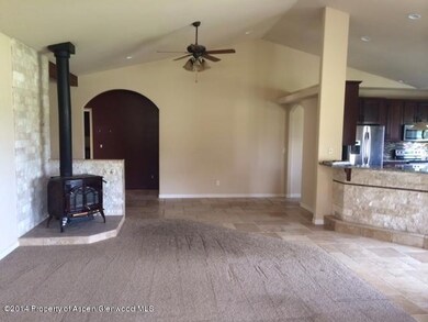living room with wood stove