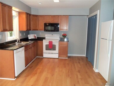 Kitchen area. Custom cabinets. Solid surface count