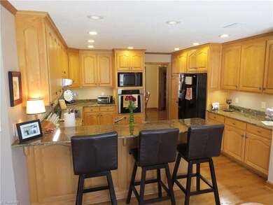 Large Kitchen with tons of cabinet space and granite countertops.