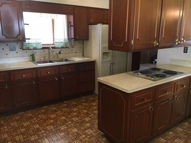 Large Eat-in-Kitchen with plenty of cabinetry.