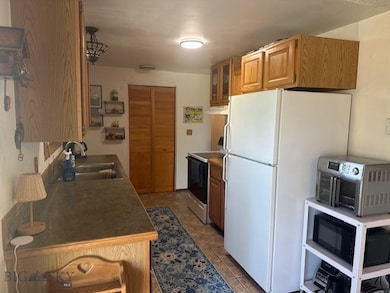 Kitchen that leads to back deck