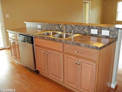 Kitchen - Kitchen has island/breakfast bar