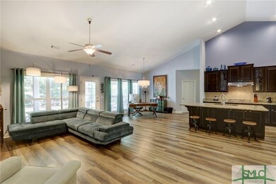 There is engineered hardwood beneath this vinyl pl