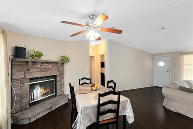 Dining room with wood burning fireplace.
