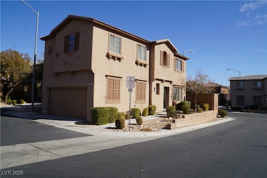 Townhome / multi-family property featuring a garag