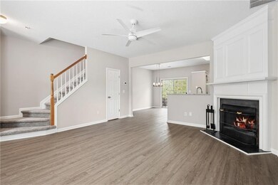 Unfurnished living room featuring visible vents, c