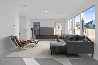 This light and bright spacious family room is the