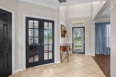 Beautiful entry with french doors at home office.