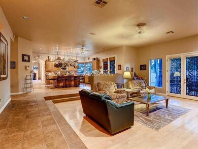 Property Photo. Comfortable sunken family room ope