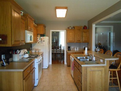 There is a built In Microwave & Dishwasher.  The stove uses natural Gas for cooking. And there is plenty of counter top space for cooking up your favorite meal for the family!