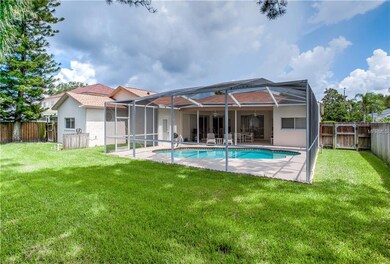 Another view of pool and backyard.