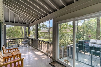 Sunroom / solarium with vaulted ceiling