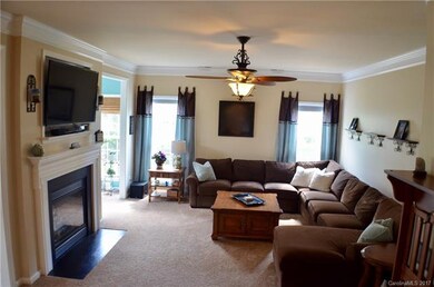Kitchen opens to family room.  Two sided fireplace