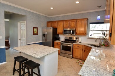 Laundry room is conveniently located in door just