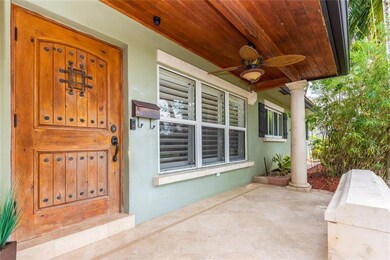 Wood barn door. Limestone front patio and bench.