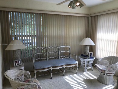 CARPETED SITTING ROOM OFF THE DINING ROOM