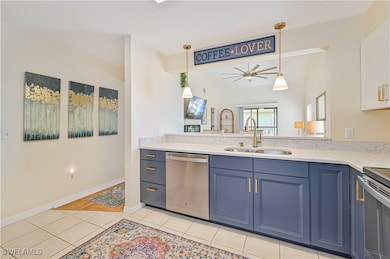 Kitchen with ceiling fan, sink, dishwasher, lofted