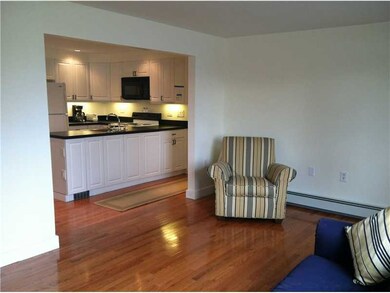 Living Room. Wall between kitchen and front room h