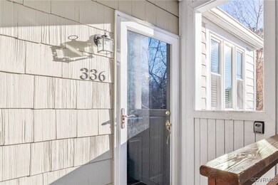 Entryway with a wealth of natural light and wood w
