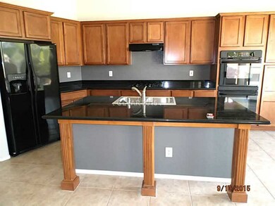 Property Photo. KITCHEN W/ ISLAND