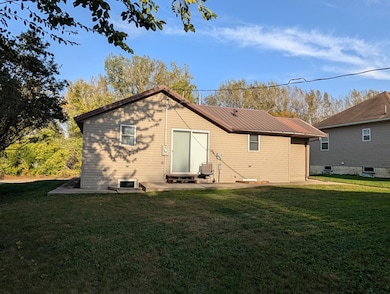 Nice sized back yard faces west & the garage.